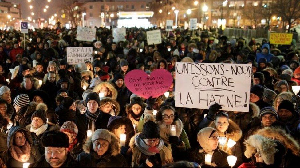 People attend a vigil in support of the Muslim community in Montreal (30 January 2017)