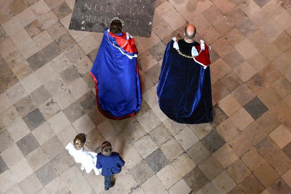 Princess Charlotte and Prince Louis entering Westminster Abbey with their parents