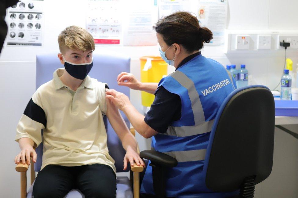 An Irish teenage boy is given a Covid-19 vaccine