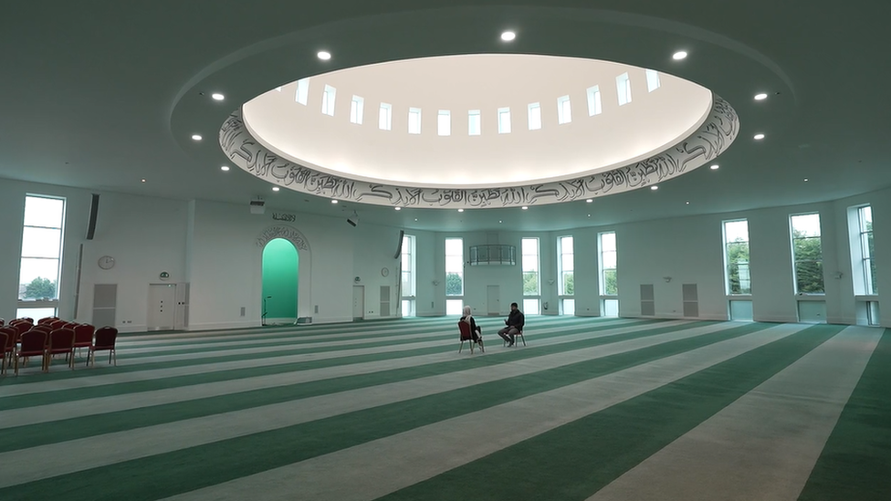 Mosque interior with stripy carpet