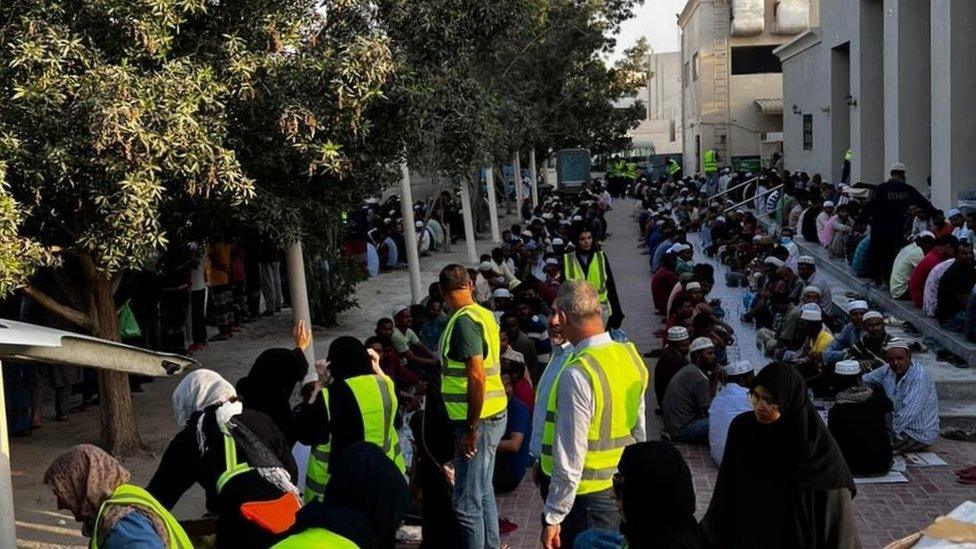 People at a migrant worker camp in Dubai