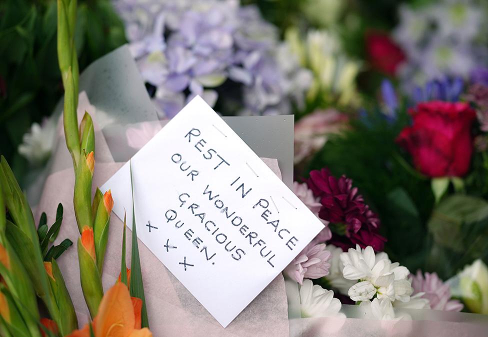 Flowers and tributes to Queen Elizabeth II are pictured outside of Windsor Castle on 9 September 2022