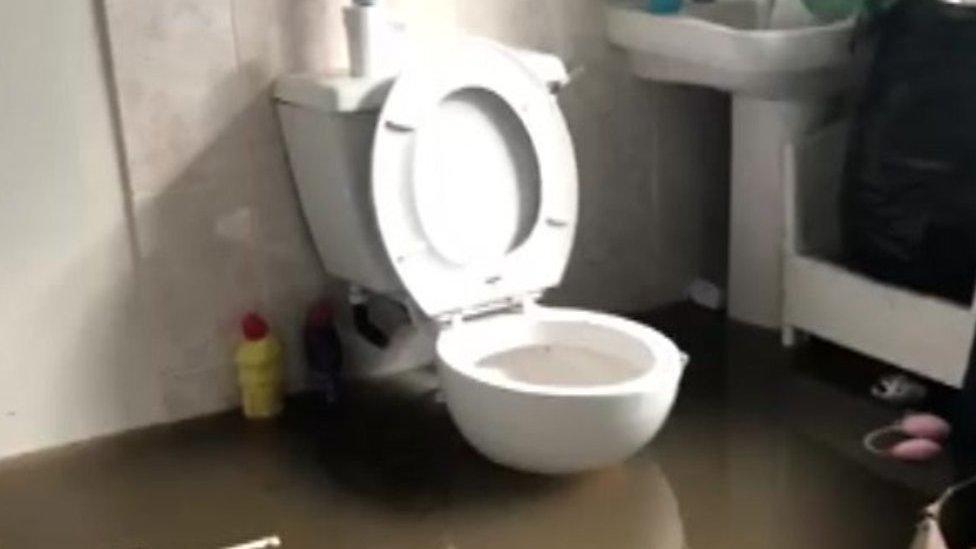 A flooded bathroom