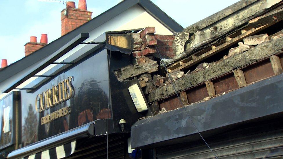 Storm damage to shops