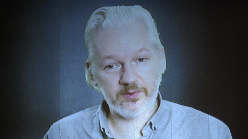 Julian Assange on a videolink