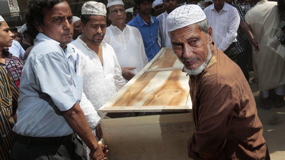 Bangladeshi Muslims carry the body of Xulhaz Mannan who was stabbed to death by unidentified assailants in Dhaka, Bangladesh, 26 April