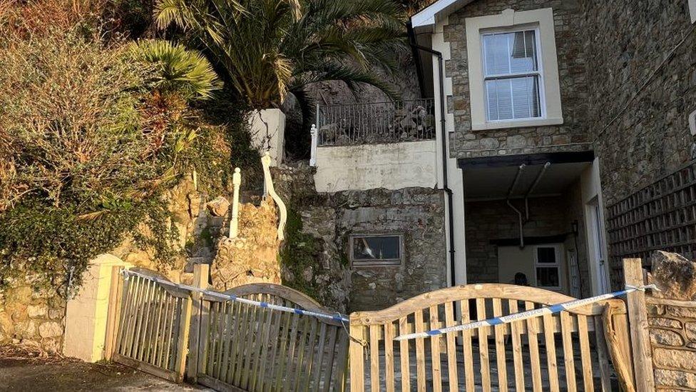 rocks that have fallen onto a balcony