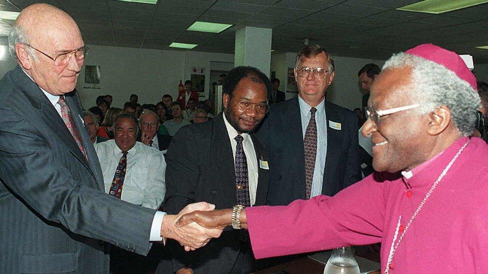 South Africa set up a Truth and Reconciliation Commission. Here its head Archbishop Desmond Tutu (right) shakes hands with former President FW de Klerk