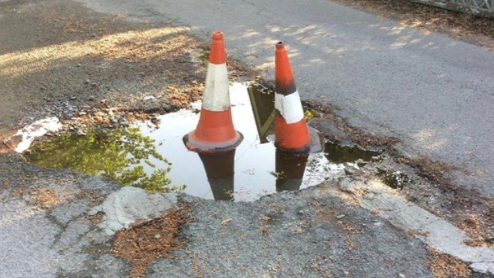 The pot hole had got bigger over the last few winters in the middle of the road near the Menai Suspension Bridge