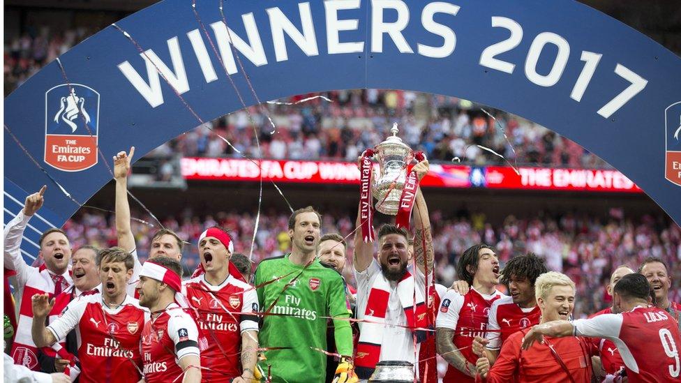 Arsenal players celebrate winning the 2017 FA cup.