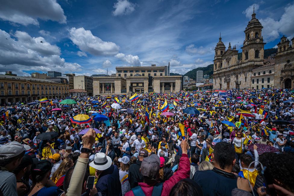 Anti-government demonstrators shout slogans during a protest against the tax reform proposed by President Gustavo Petro in Bogota, Colombia, on 26 September 2022.