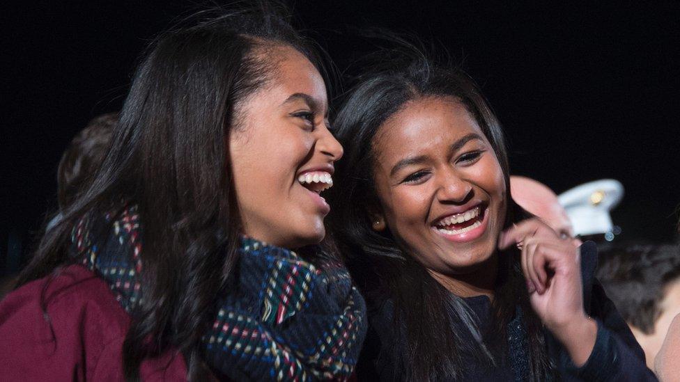 Malia and Sasha smiling