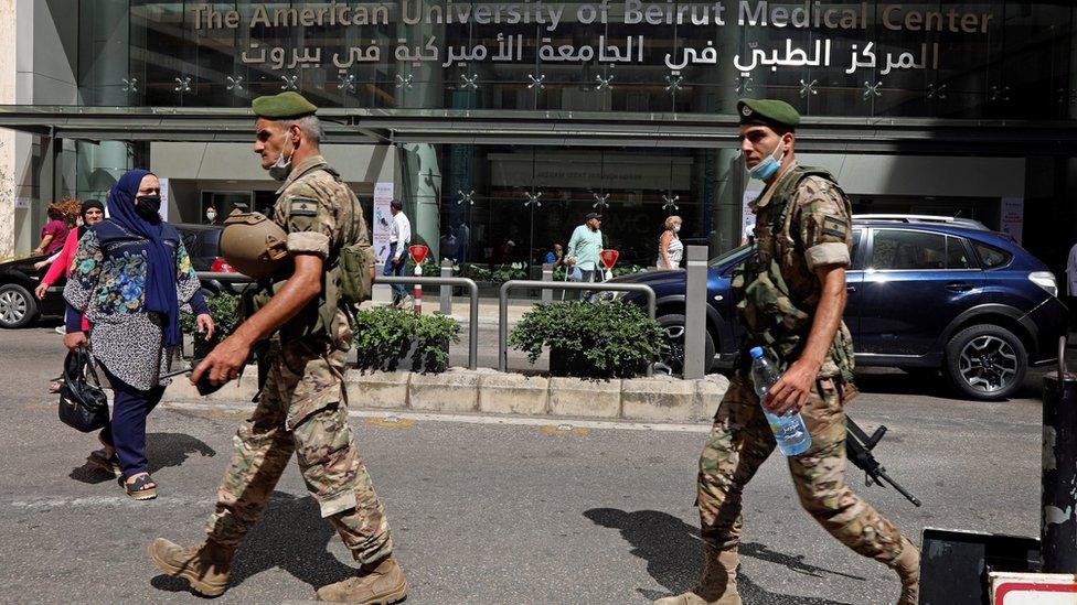 Lebanese soldiers walk past the American University of Beirut (AUB) medical centre in Beirut, Lebanon (17 July 2020)