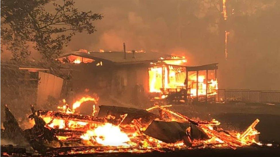 The couple's house burning