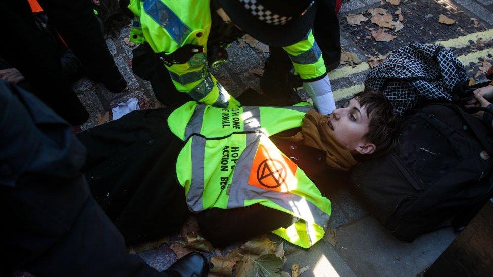 Climate activists lie outside Downing Street