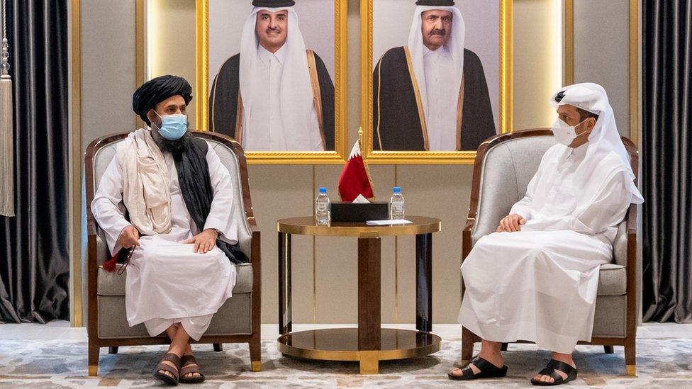 Qatar's Deputy Prime Minister and Minister of Foreign Affairs Mohammed bin Abdul Rahman Al Thani meets with Mullah Abdul Ghani Baradar, head of the Taliban's political bureau, in Doha, Qatar (17 August 2021)