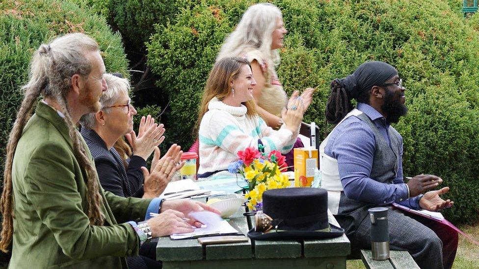 People in the audience at the Bardic Picnic in Northampton clapping