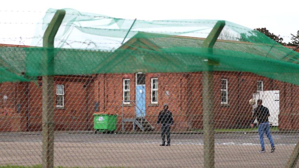 Asylum seekers at Napier Barracks