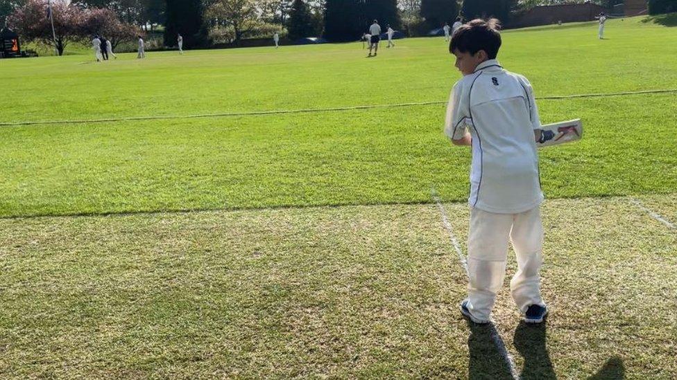 Hugo playing cricket