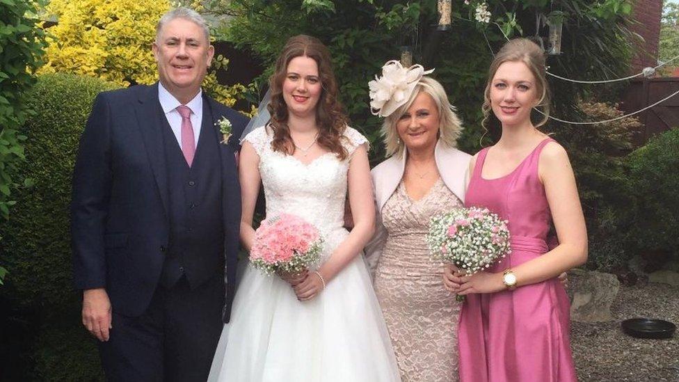 Ali with his wife and daughters on Alison's wedding day