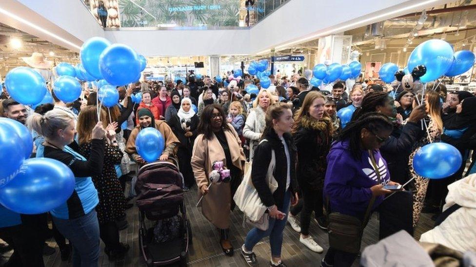 People entering the store