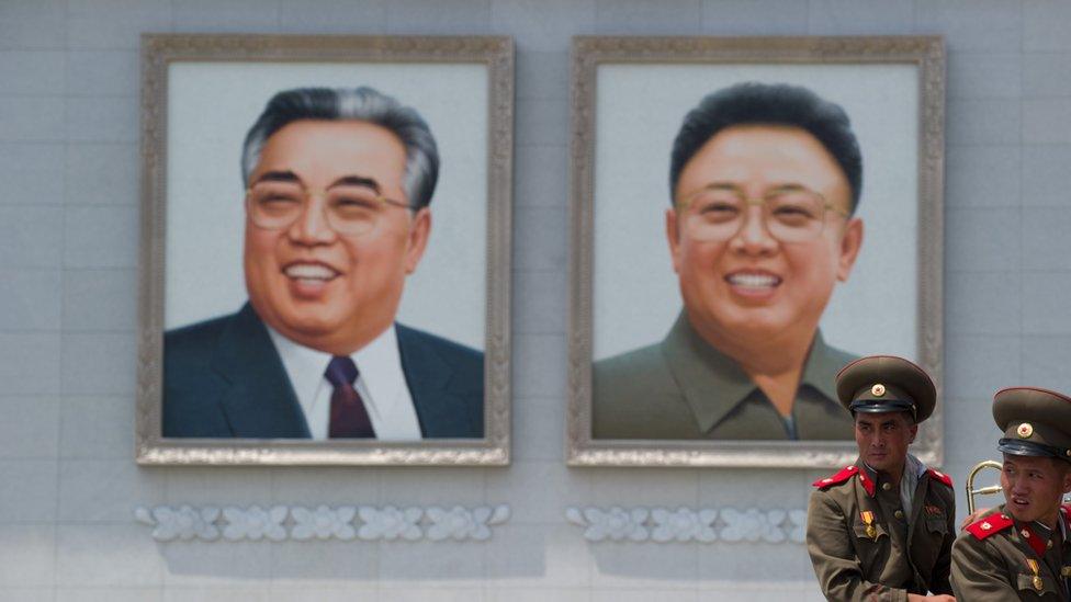 Portraits of Kim Il-sung and Kim Jong-il