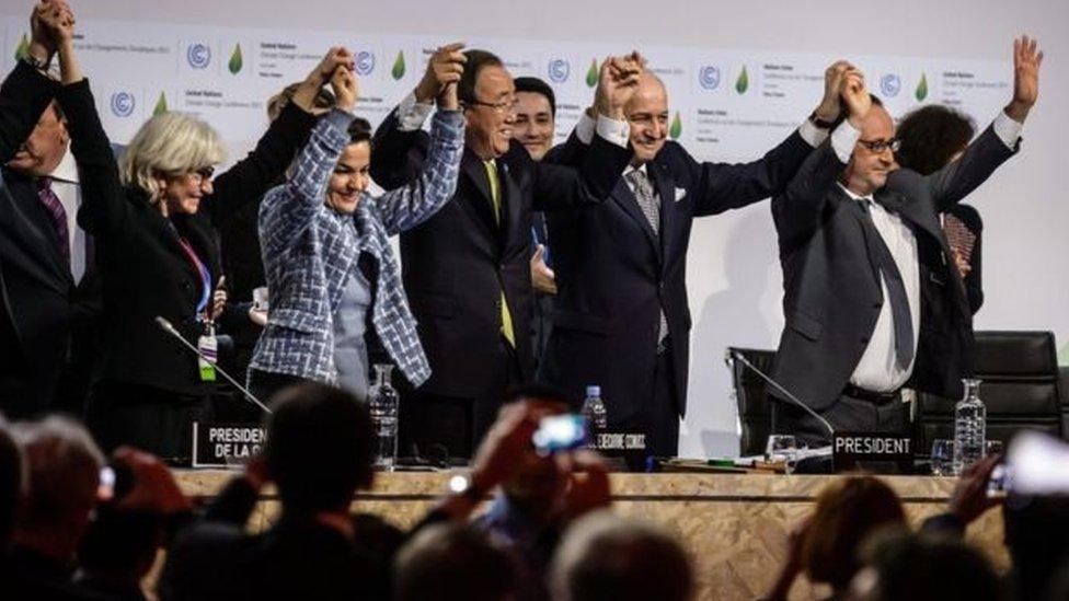 UN Secretary-General Ban Ki-moon and French President Hollande celebrate the Paris deal