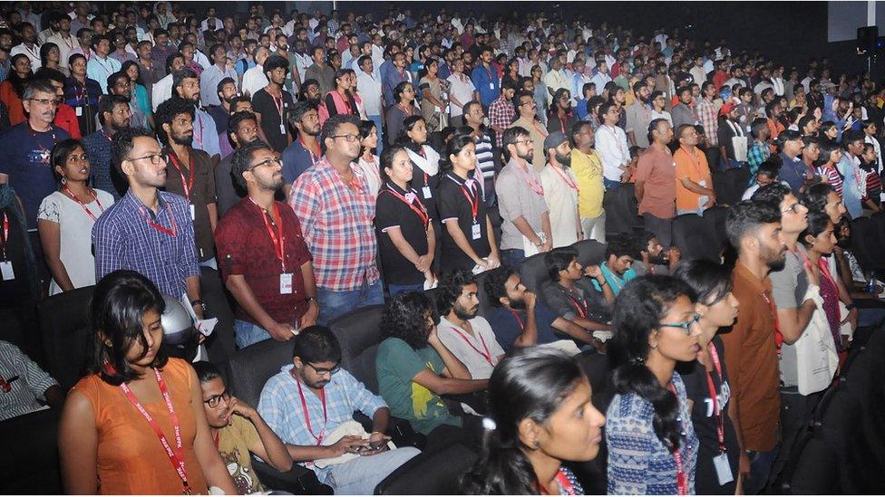 Protesters at Kairali theatre before a screening on Sunday