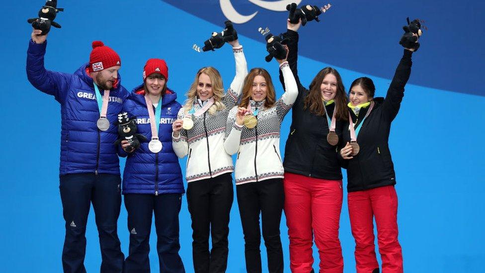 Silver medalist Millie Knight of Great Britain, Gold medalist Henrieta Farkasova of Slovakia and bronze medalist Eleonor Sana of Belgium pose for the medal ceremony of the Alpine Skiing Women's Downhill - Visually Impaired during day one of the PyeongChang 2018 Paralympic Games on March 10, 2018 in Pyeongchang-gun, South Korea.