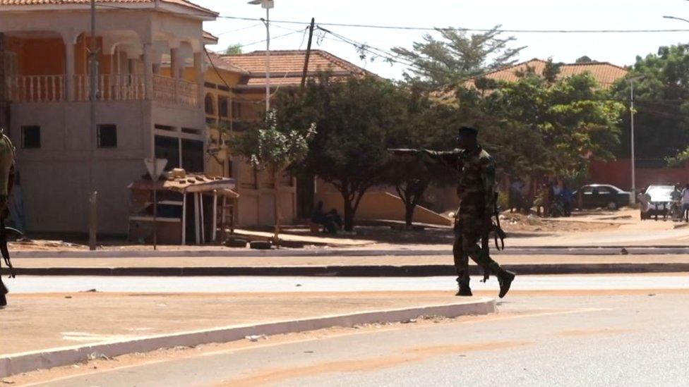 A soldier patrols the government palace area in Bissau, capital of Guinea-Bissau, on February 1 2022