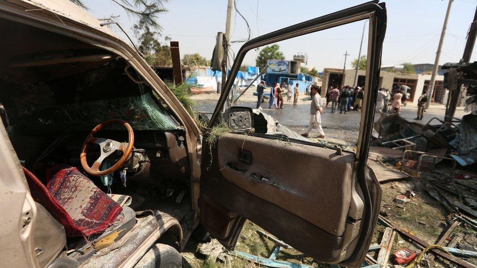 People inspect the scene of an explosion in Kabul, Afghanistan, 09 September 2020