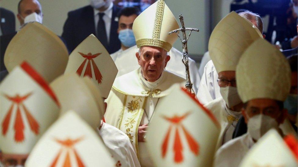 Pope Francis arrives to lead a mass at the Chaldean Cathedral of Saint Joseph in Baghdad, Iraq March 6, 2021