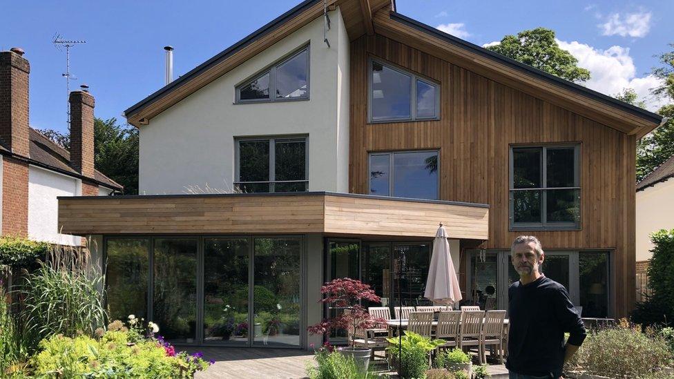 Colin Heal in front of his award-winning home