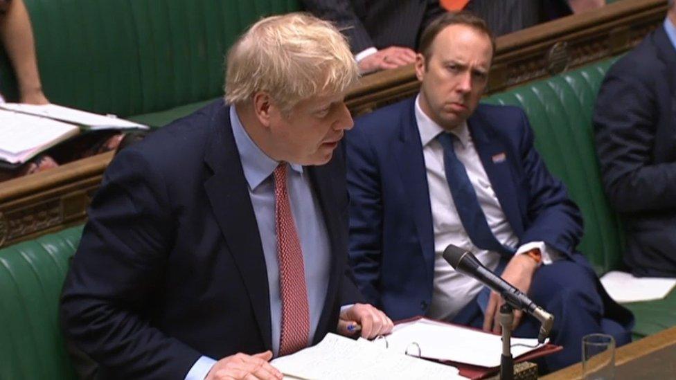 Health Secretary Matt Hancock watching Prime Minister Boris Johnson speak during Prime Minister's Questions in the House of Commons, London, both of them have tested positive for coronavirus