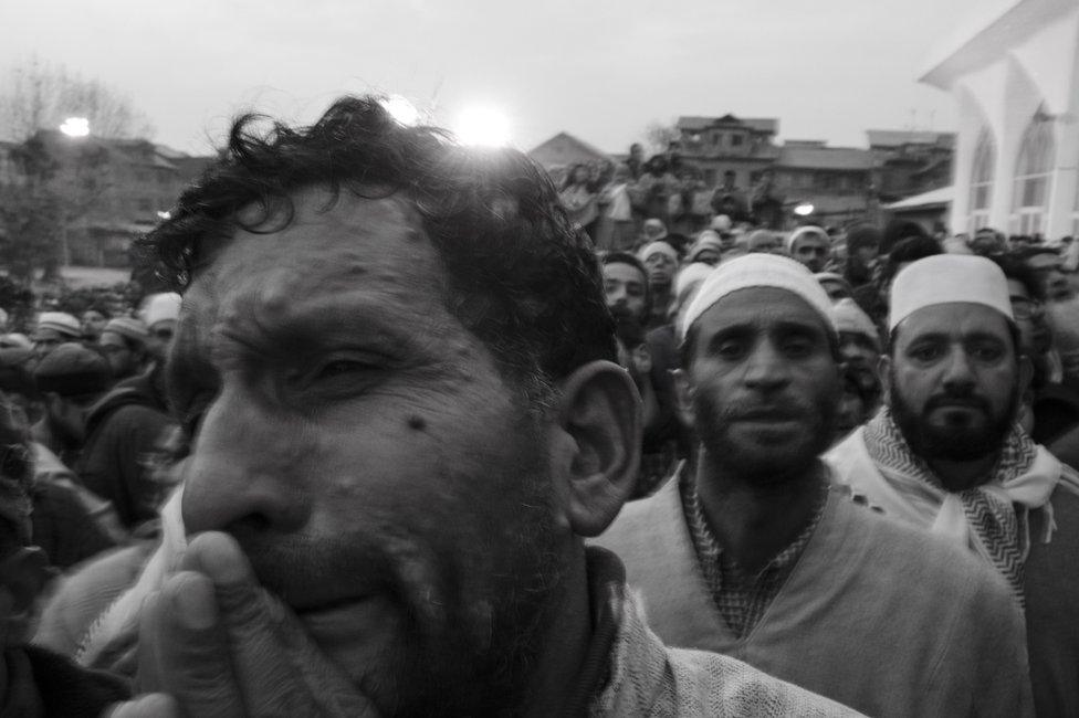 People praying at Hazratbal shrine which is flanked by Dal Lake