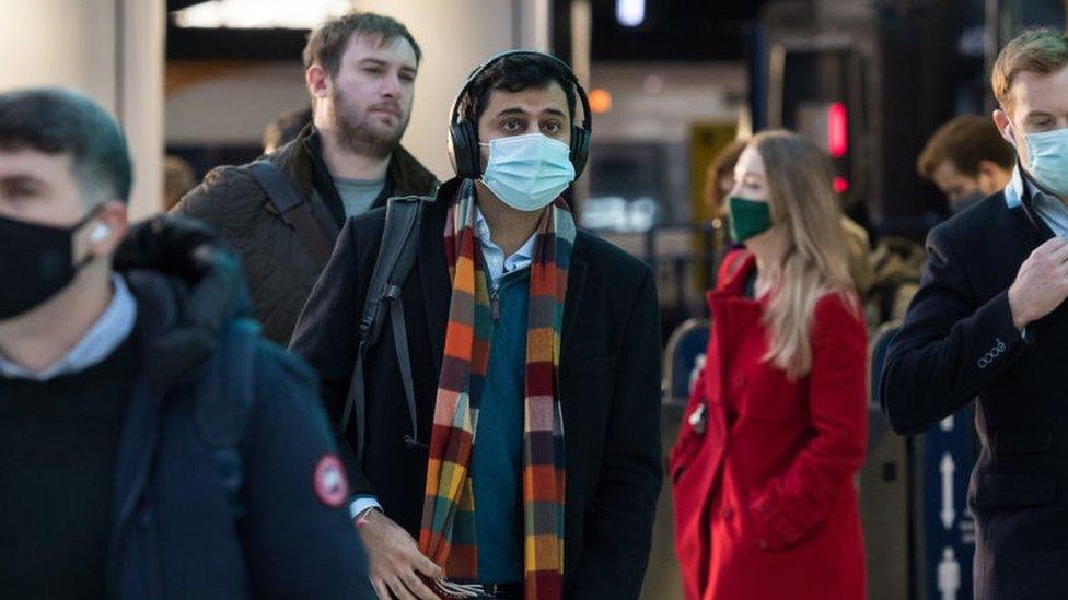 A commuter at Waterloo station in London