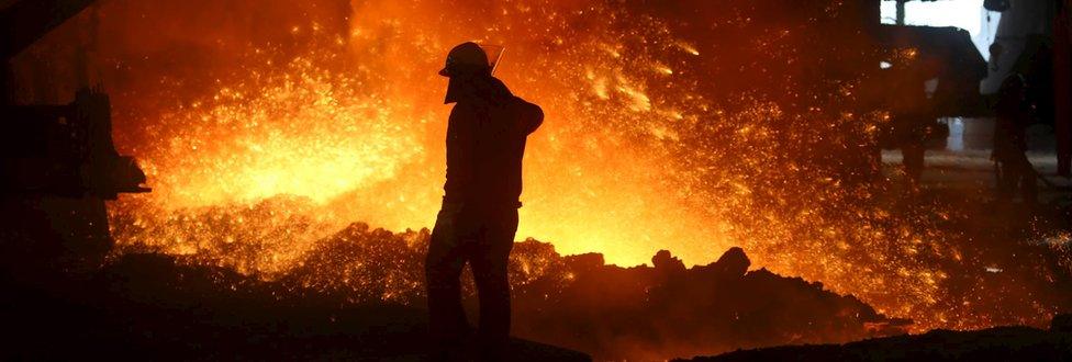 A worker inside a Chinese steel factory