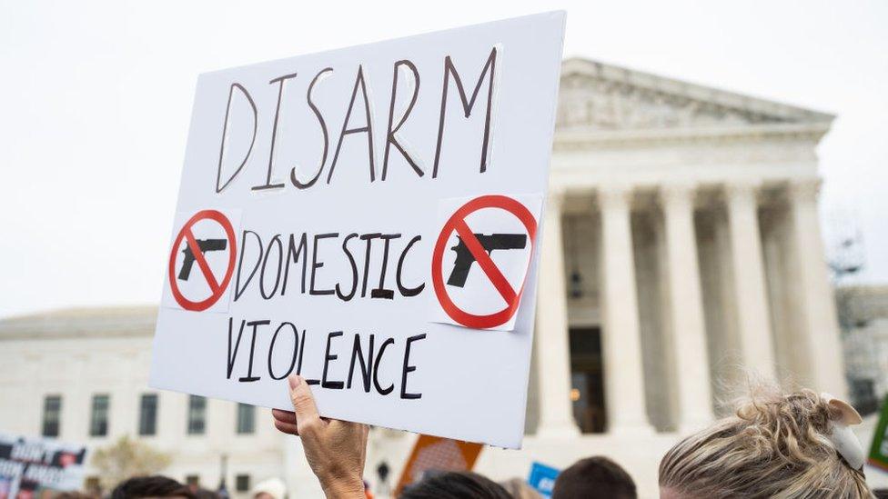 Protesters outside the court on Tuesday