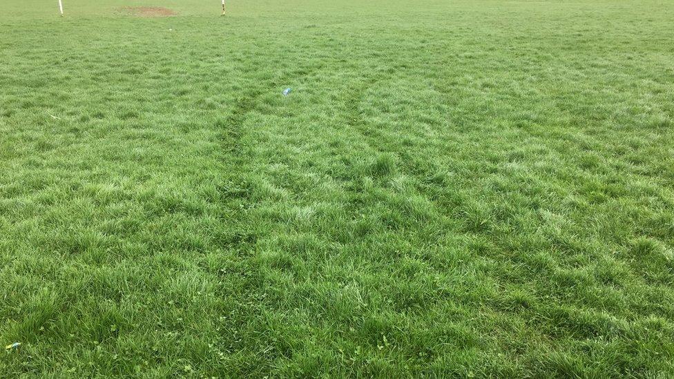 Tyre marks on the pitch