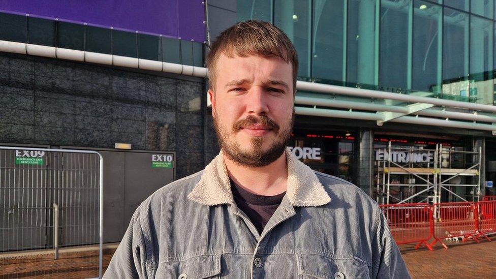 Fan outside Old Trafford Stadium