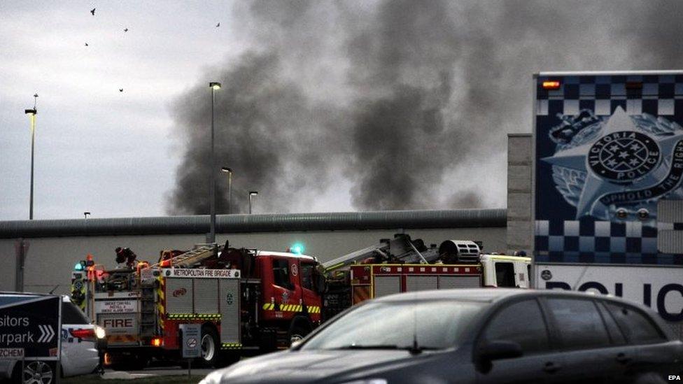 Smoke rises from the Metropolitan Remand Centre in Ravenhall in Victoria, Australia