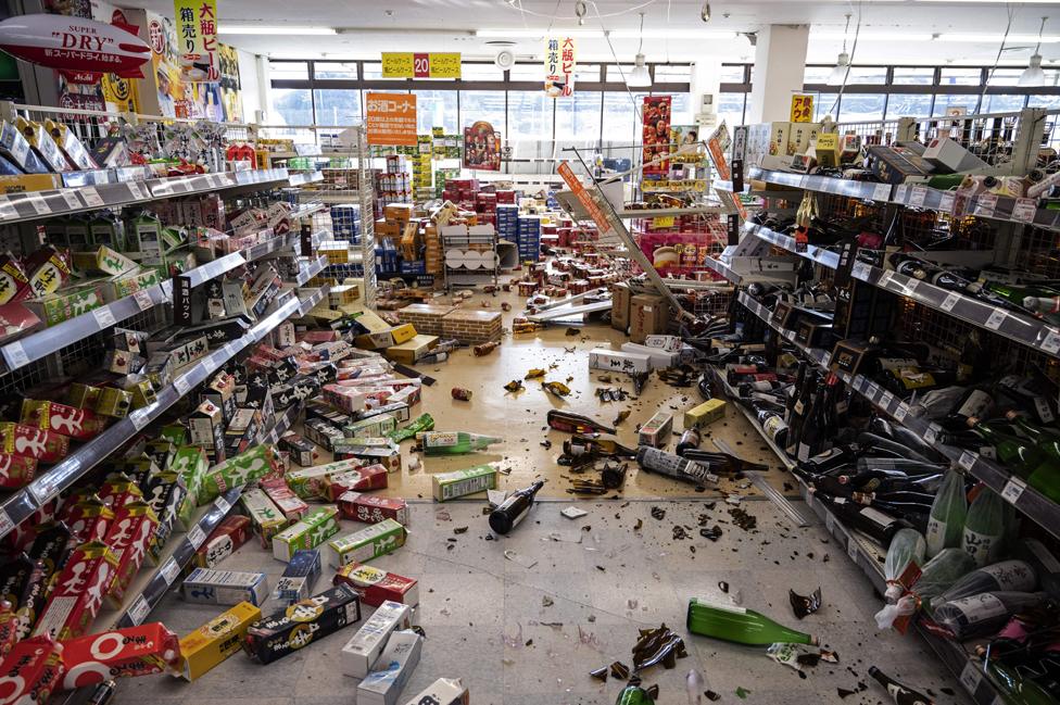 A supermarket littered with merchandise in Shiroishi, Miyagi prefecture in Japan on 17 March 2022 after a 7.3-magnitude earthquake jolted the north-east of the country.