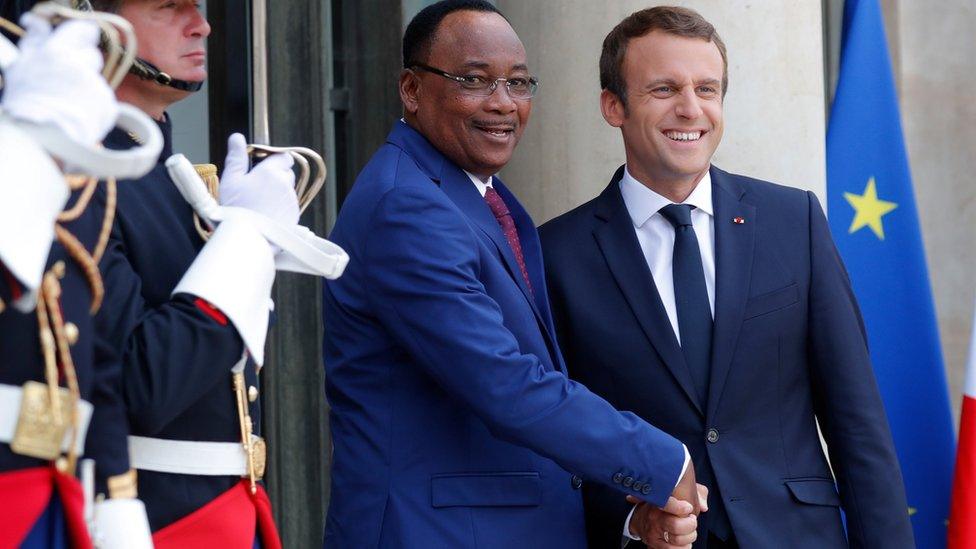 Niger president Issofou (L) is greeted by French president Macron