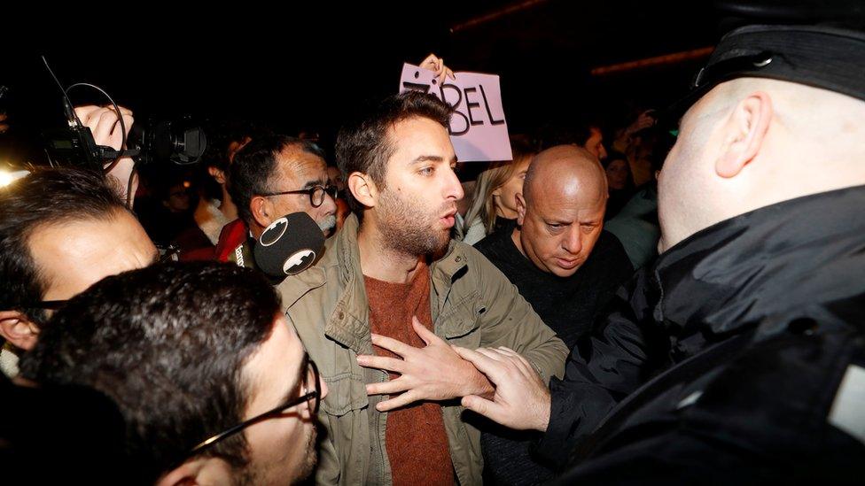 Matthew Caruana Galizia, son of murdered of journalist Daphne Caruana Galizia, argues with a policeman as police push the demonstrators as they wait for the exit of Malta's Prime Minister Joseph Muscat outside the Government Palace in Valletta, Malta, November 29, 2019.