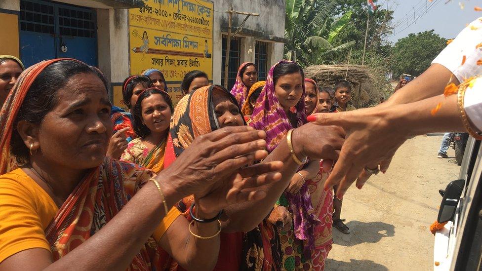 Women shaking hands