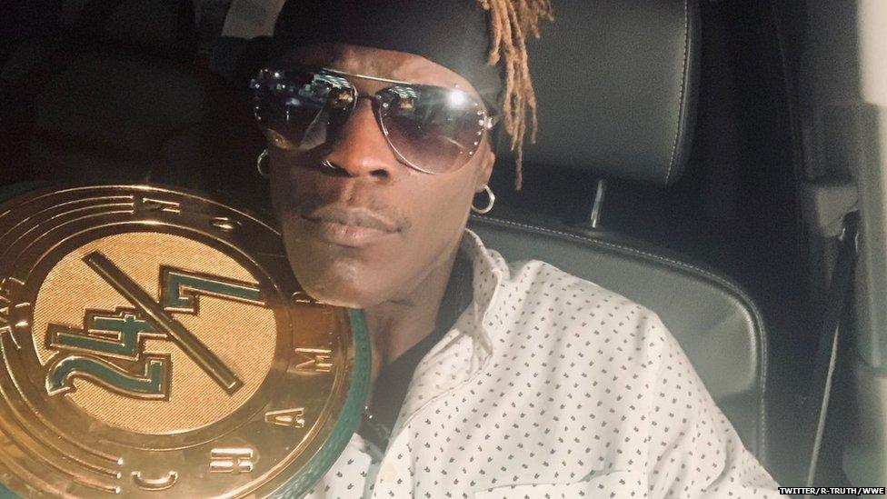 Wrestler R-Truth with the new 24/7 Championship belt