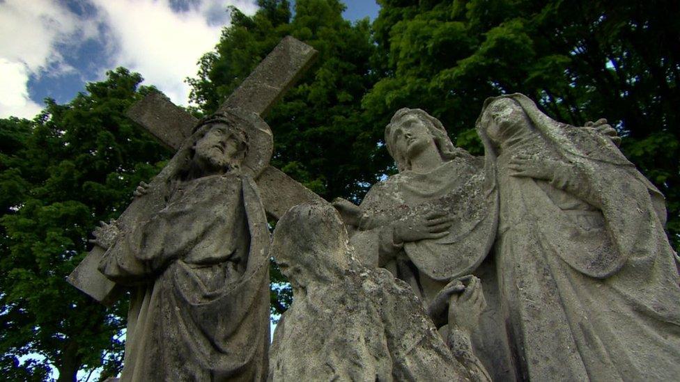 Pictures of religious figures carrying a cross