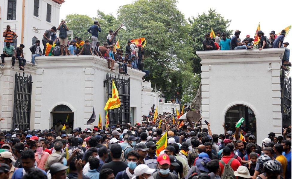 Demonstrators protest inside the President's House, after President Gotabaya Rajapaksa fled, in Colombo