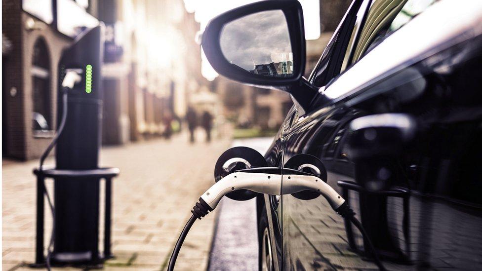 Electric car charging - stock shot