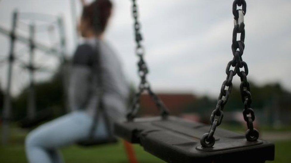 A child on a swing